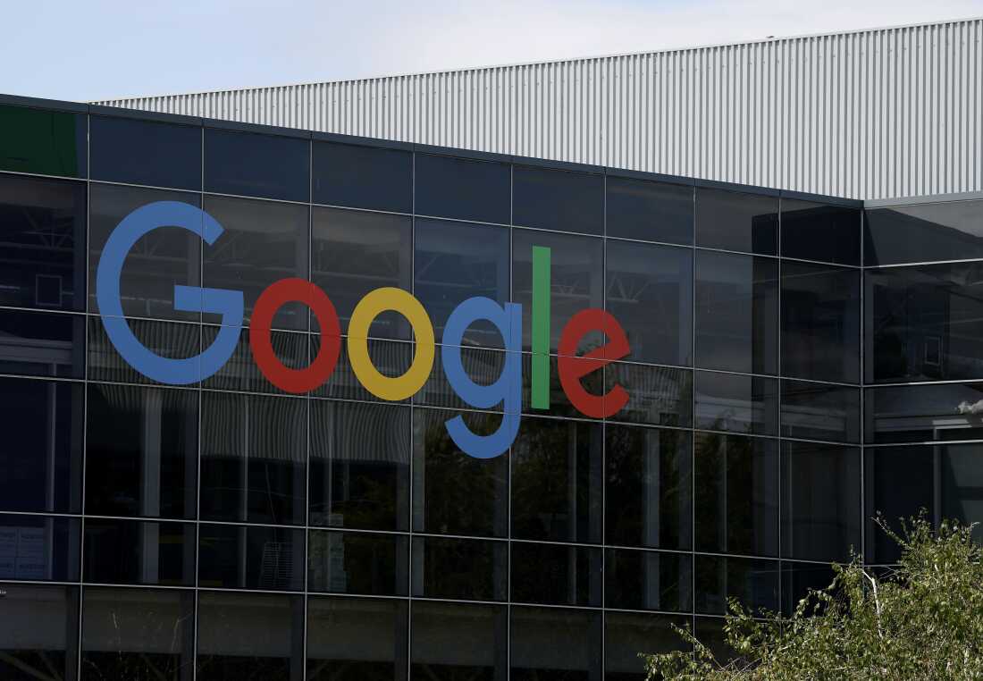 A sign is posted on the exterior of a building on the Google headquarters campus Mountain View, California. Google parent company Alphabet reported better-than-expected second-quarter earnings with revenue of $96.43 billion compared to analyst expectations of $94 billion.