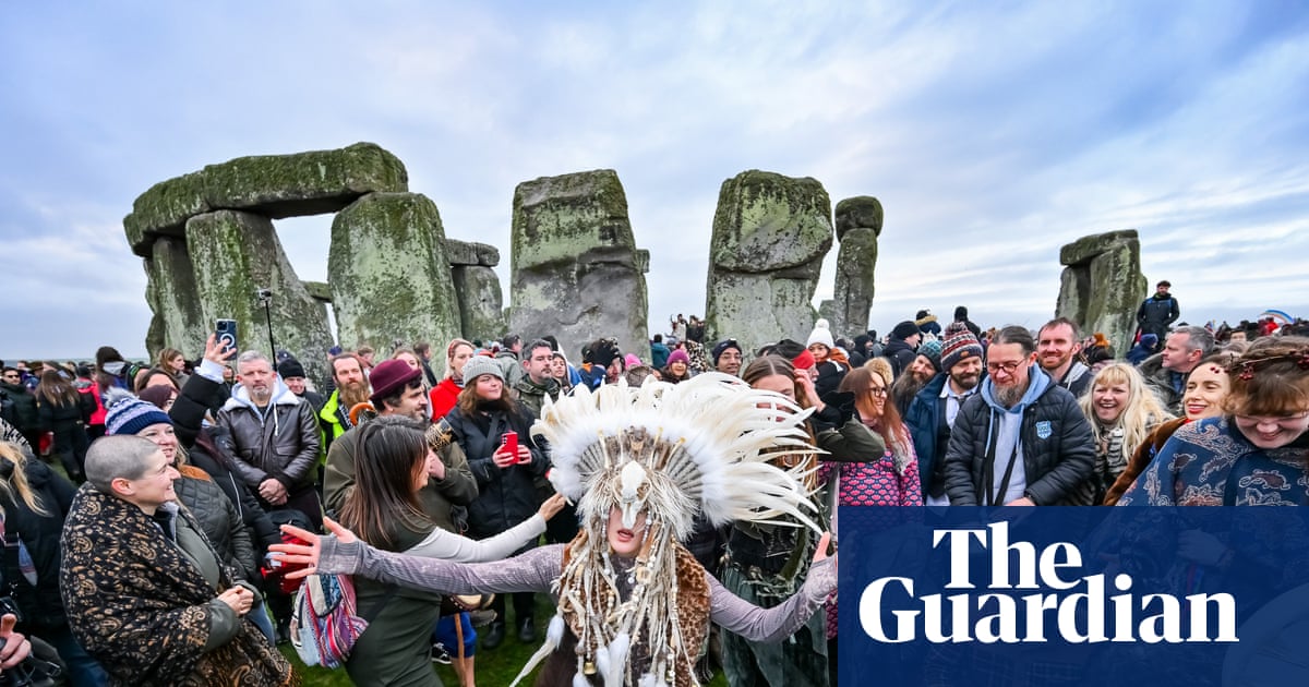 ‘I feel special, in my heart’: thousands gather at Stonehenge for winter solstice | Stonehenge