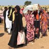 Displaced Sudanese who fled el-Fasher after the city fell to the Rapid Support Forces (RSF), arrive in the town of Tawila war-torn Sudan's western Darfur region on October 28, 2025.