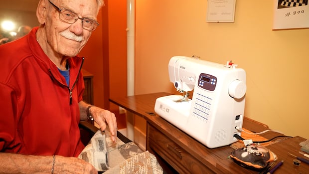 Sewer stitches up funds for Steinbach food bank with bags made from throwaways