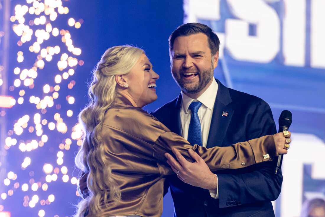 Erika Kirk greets Vice President JD Vance during Turning Point USA's AmericaFest 2025, Sunday, Dec. 21, 2025, in Phoenix.