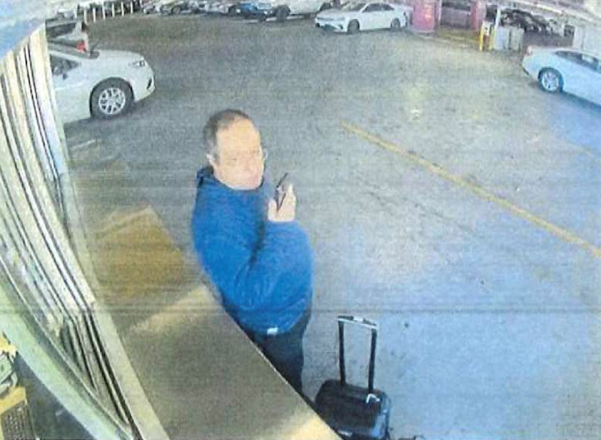 Claudio Manuel Neves Valente, the suspect in the Brown University shooting in Providence, Rhode Island, picks up a vehicle at an Alamo Rent a Car in this frame grab from CCTV released by Providence Police.