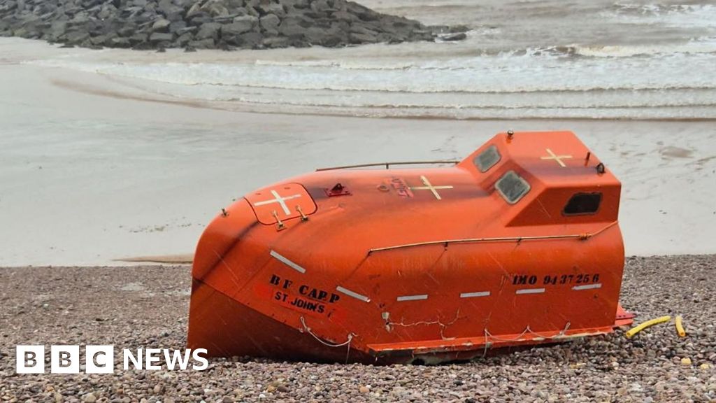 Missing lifeboat washes up on Devon beach