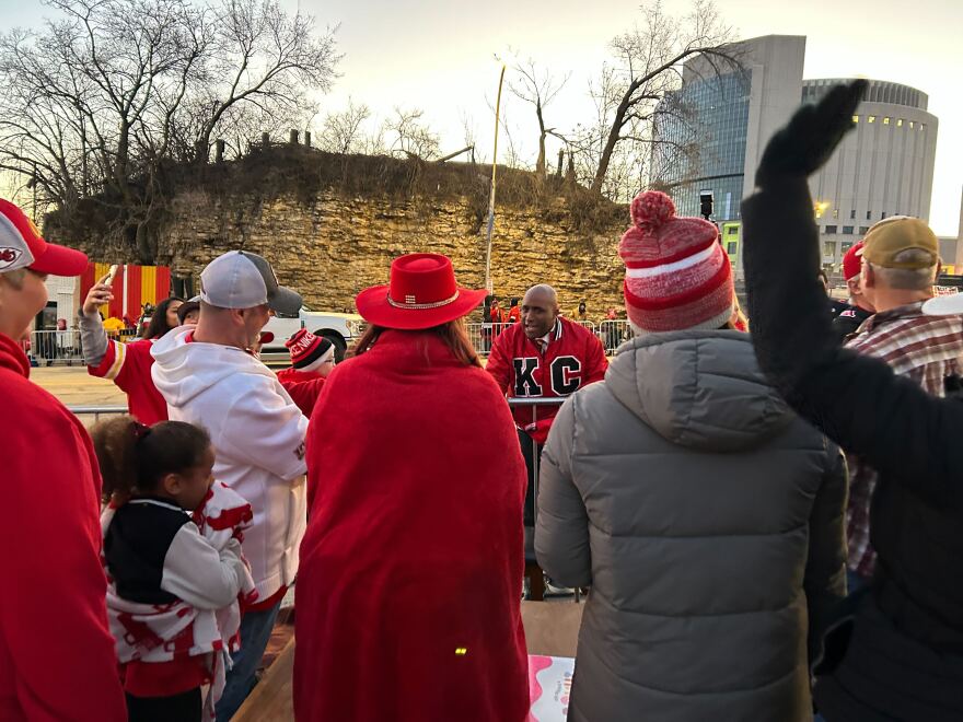 Kansas City Mayor Quinton Lucas greets Chiefs fans along the parade route on Feb. 14, 2024.