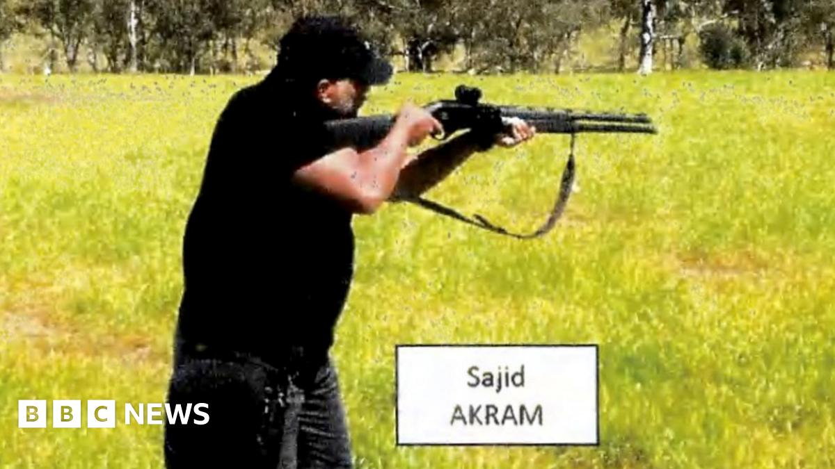 The image of a candle lit up on the Opera House sails