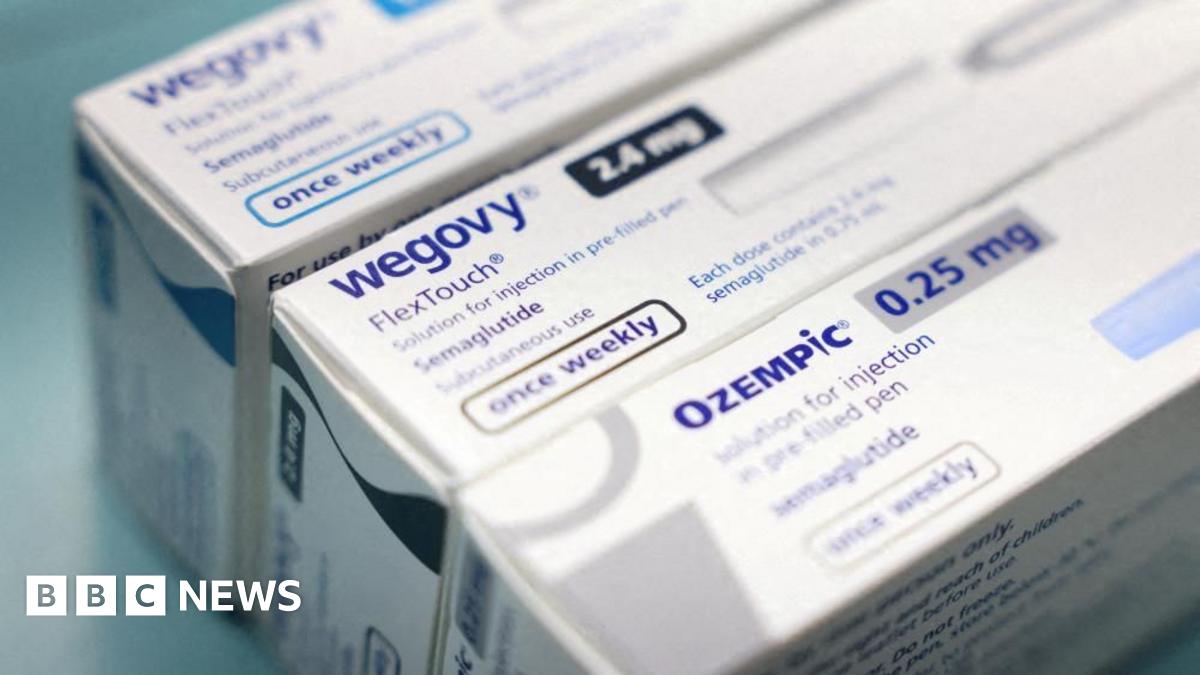 White boxes of Ozempic and Wegovy made by Novo Nordisk are seen at a pharmacy