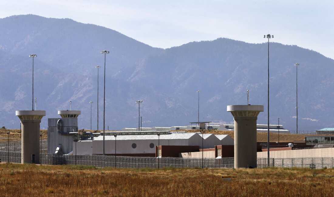 A guard tower looms over a federal prison complex which houses a Supermax facility outside Florence, Colo., in 2015.