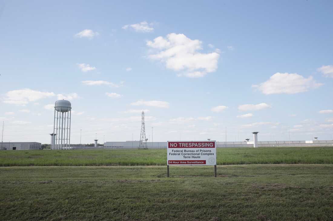 A sign warns away trespassers at the Federal Correctional Complex Terre Haute in2019 in Terre Haute, Ind.