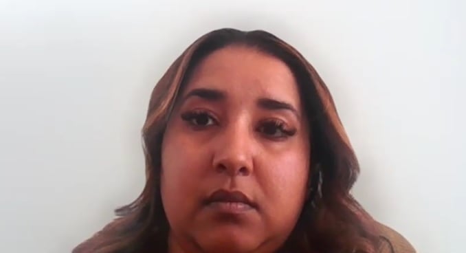 Ashmin Goolab appears during a video call.