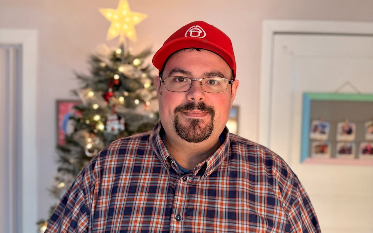 Jonathan King stands inside a home.