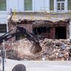 An excavator works to clear rubble after the East Wing of the White House was demolished on Oct. 23 in Washington, D.C. The demolition is part of President Trump's plan to build a multimillion-dollar ballroom.