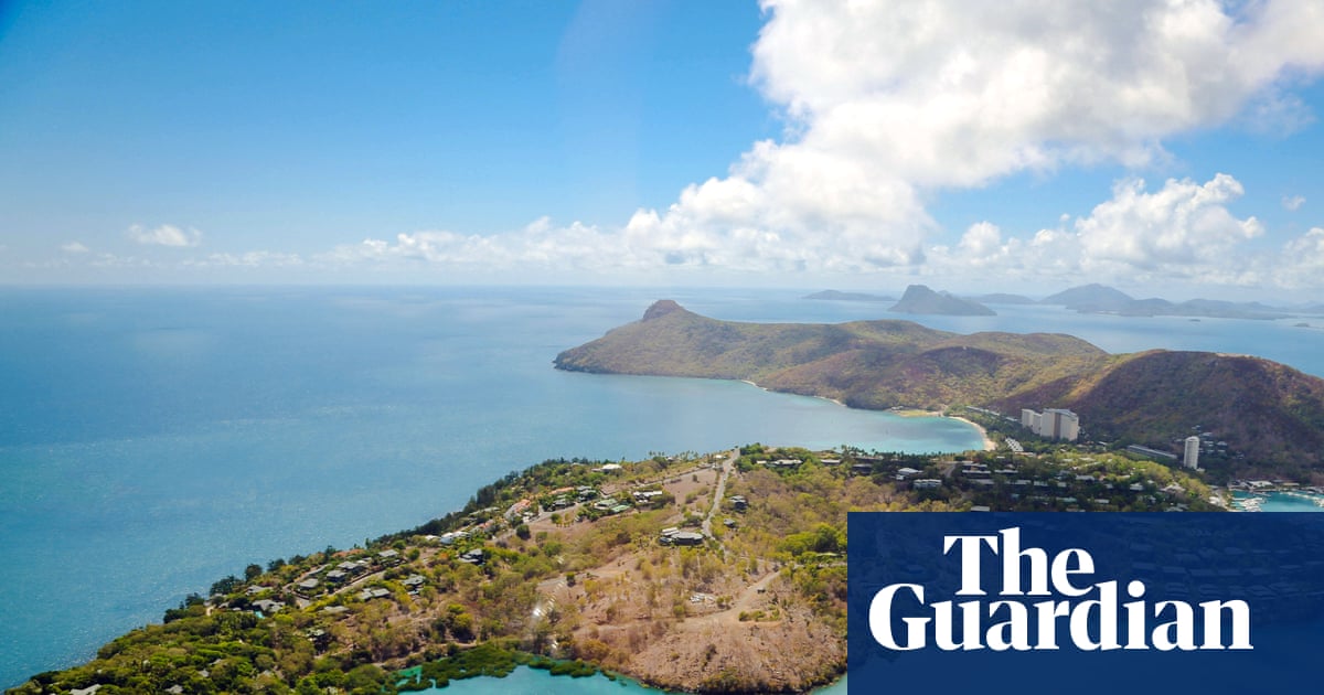 Great Barrier Reef’s Hamilton Island to be bought by US private equity firm in reported $1.2bn sale | Queensland