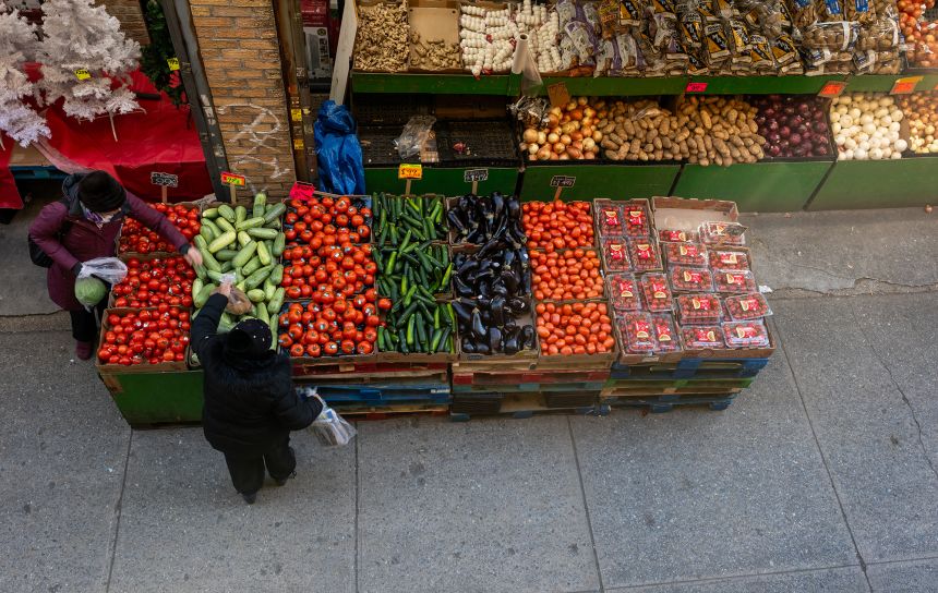 People shop at an outdoor market in Brooklyn on December 12 in New York City.
