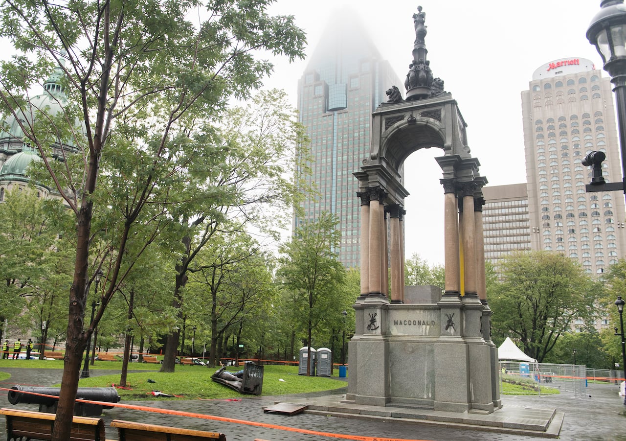 The statue of Sir John A. MacDonald is shown torn down following a demonstration in Montreal, Saturday, Aug. 29, 2020.