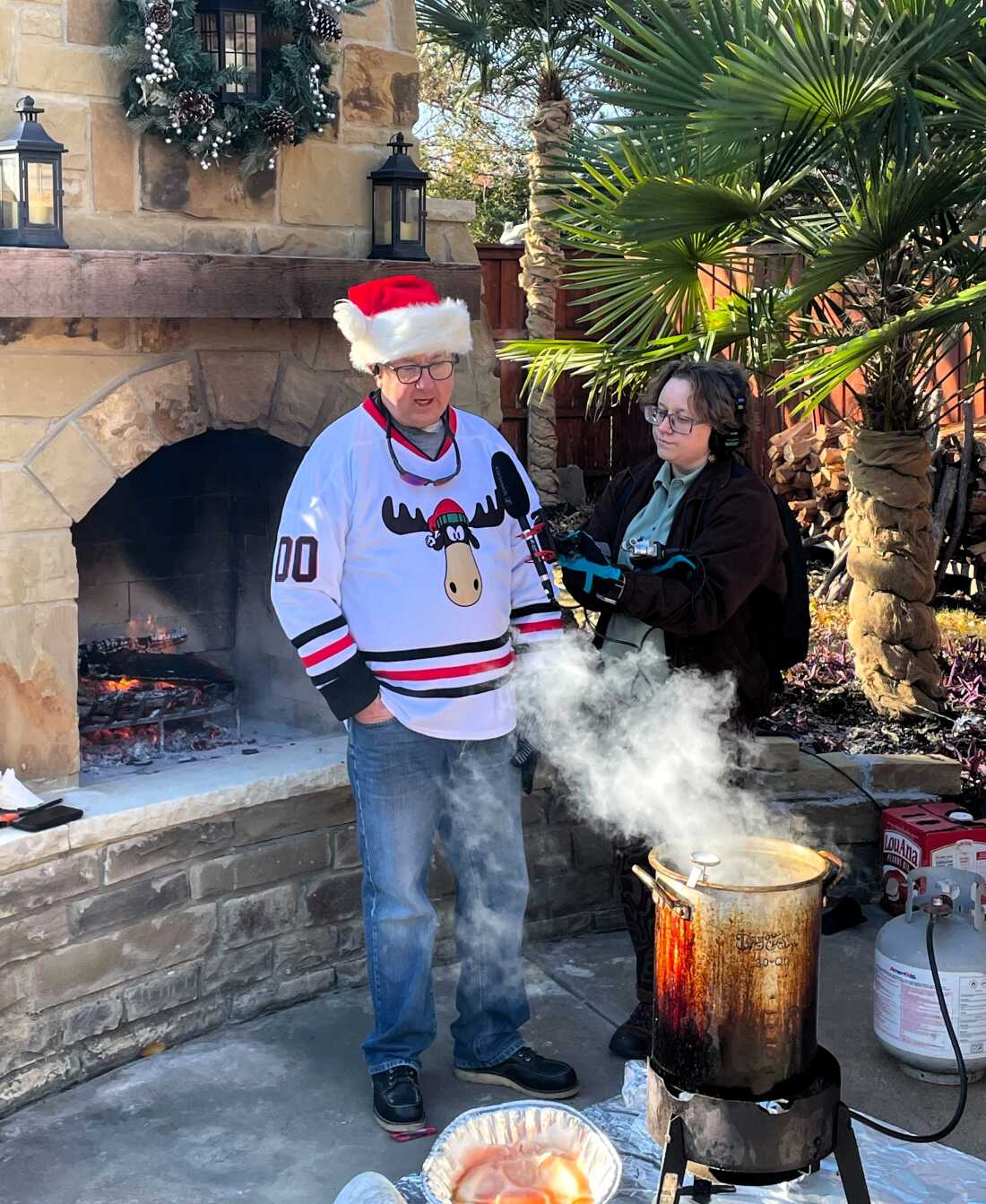 Steve Inskeep's brother, Bruce Inskeep, uses his 23 years of turkey frying experience to give NPR a demonstration on how to safely deep-fry a turkey for the holidays.