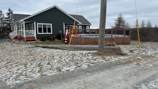 Family wants answers from NSP after wobbly power pole falls, nearly sparks fire during storm