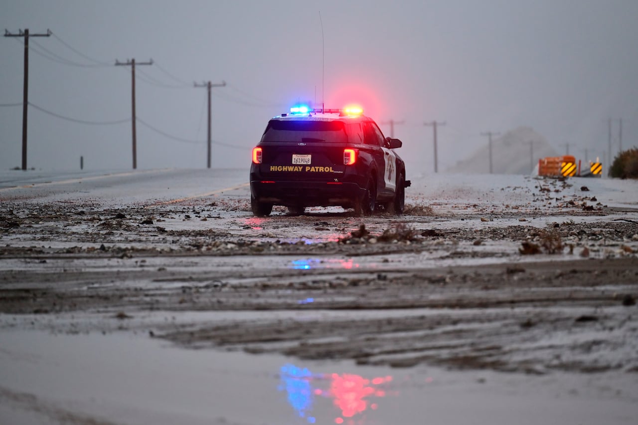 Police car is seen on snowy ground