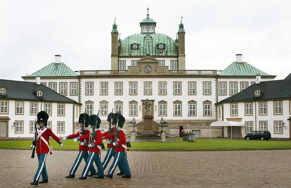 Guards march in the courtyard of Fredensborg Palace in Denmark. The northern European country of around 6 million people has been suggested as a model for U.S. childhood vaccination policy.