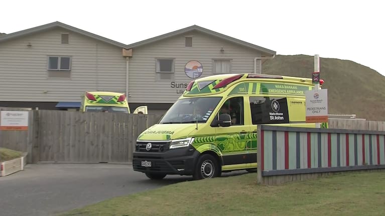 Ambulances respond to the scene in Port Waikato.