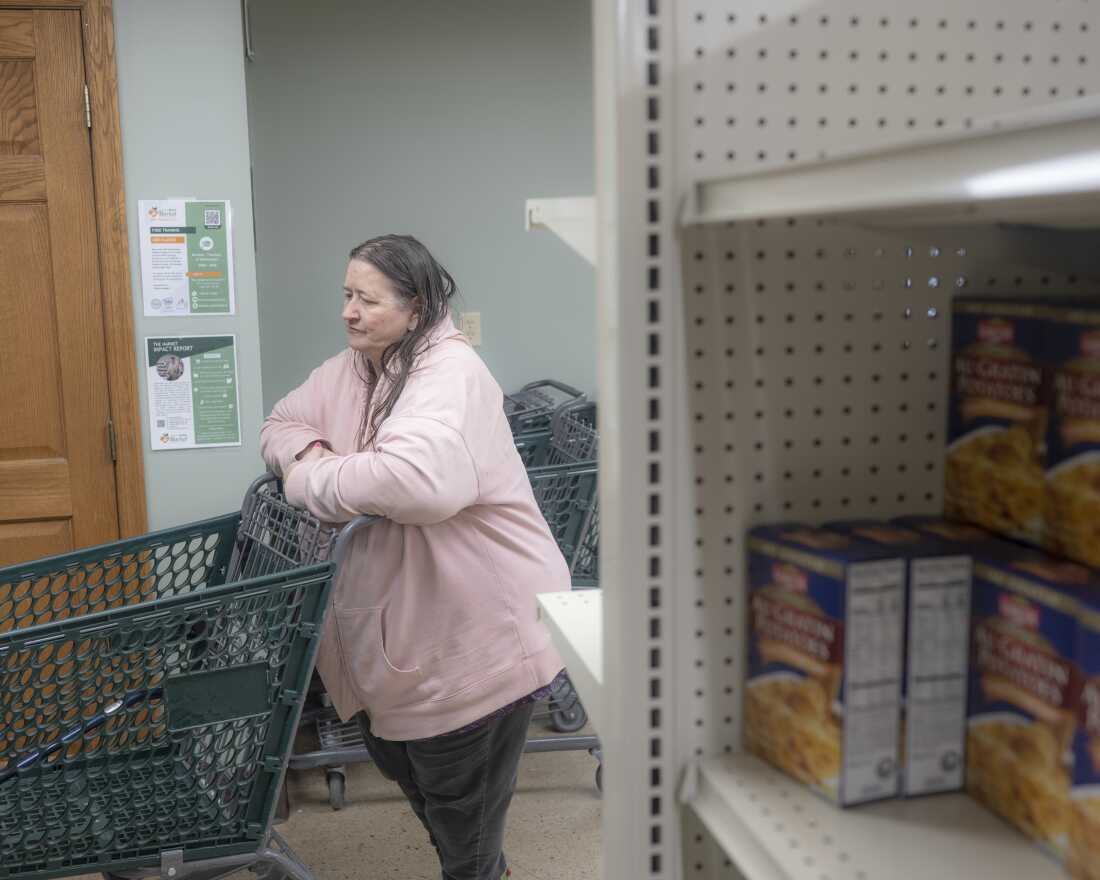 Lisa Murphy of Junction City, Ohio grocery shops at The Market at Hocking Drive on Dec. 9.