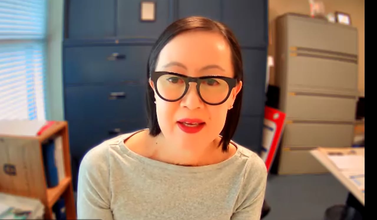 Close-up of Tania captured on Zoom.