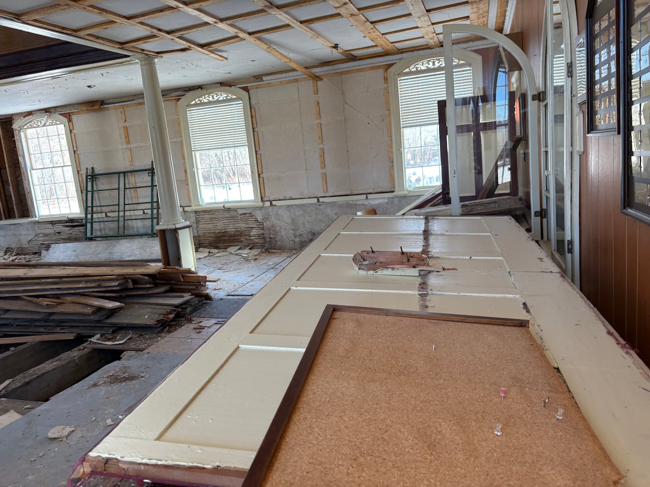 Inside of an historic church with the floor taken apart, we can see the foundation.