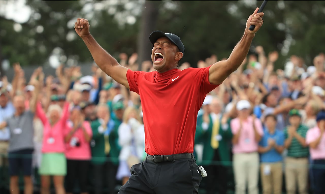 A golfer celebrates.