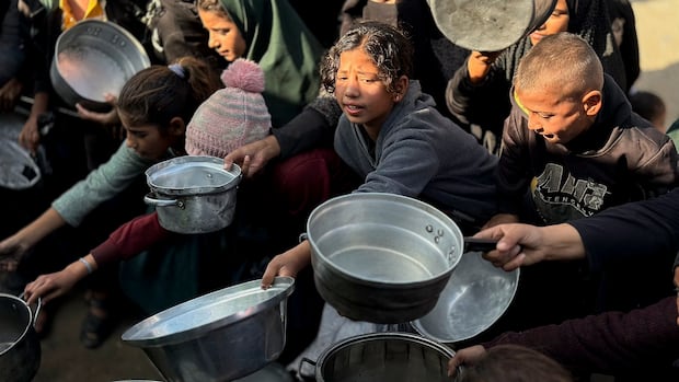 Israel will ban dozens of aid groups from Gaza starting on New Year's Day