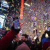 Revelers celebrate after the ball drops in New York's Times Square, Wednesday, Jan. 1, 2025, in New York.