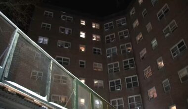 Man killed, 14-year-old wounded in shooting in hallway of Bronx apartment building