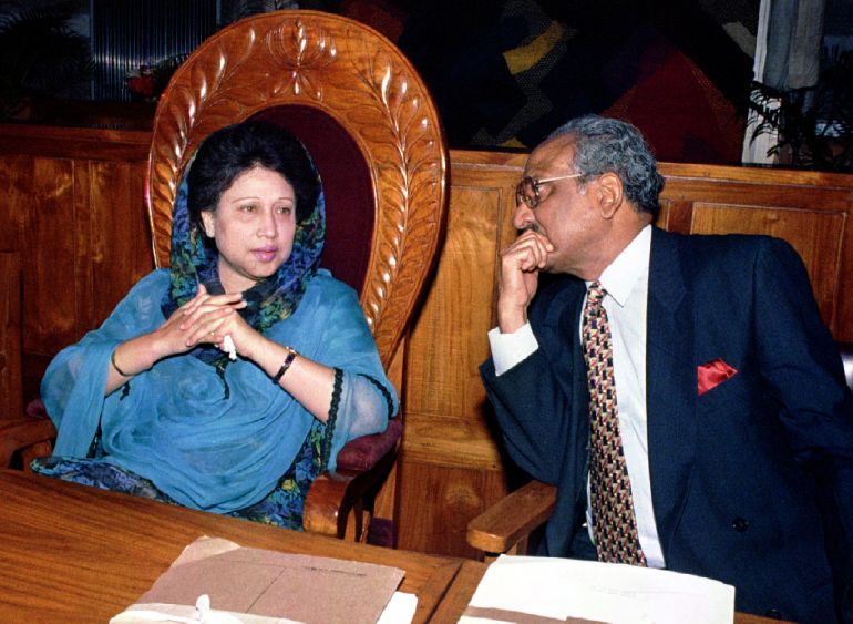 Prime Minister Begum Khaleda Zia (L) and Finance Minister Saifur Rahman discuss Bangladesh's 1995/96 budget placed in parliament June 15. Boycotting opposition parties staged violent protests outside