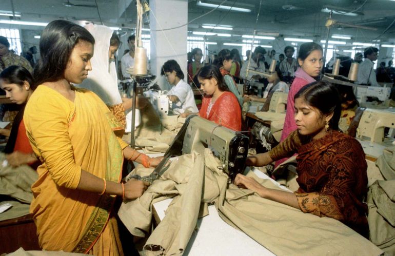 Workers produce export quality garments at a Bangladesh factory in Dhaka October 6. Textile products fetch the impoverished south Asian country some U.S.$3 billion in annual exports, thus becoming the highest foreign exchange earner.