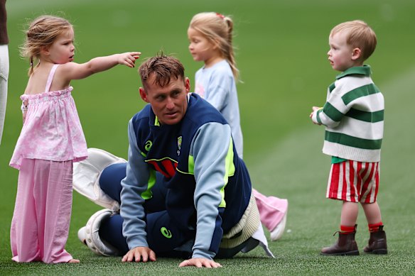 Marnus Labuschagne among the kids at training.
