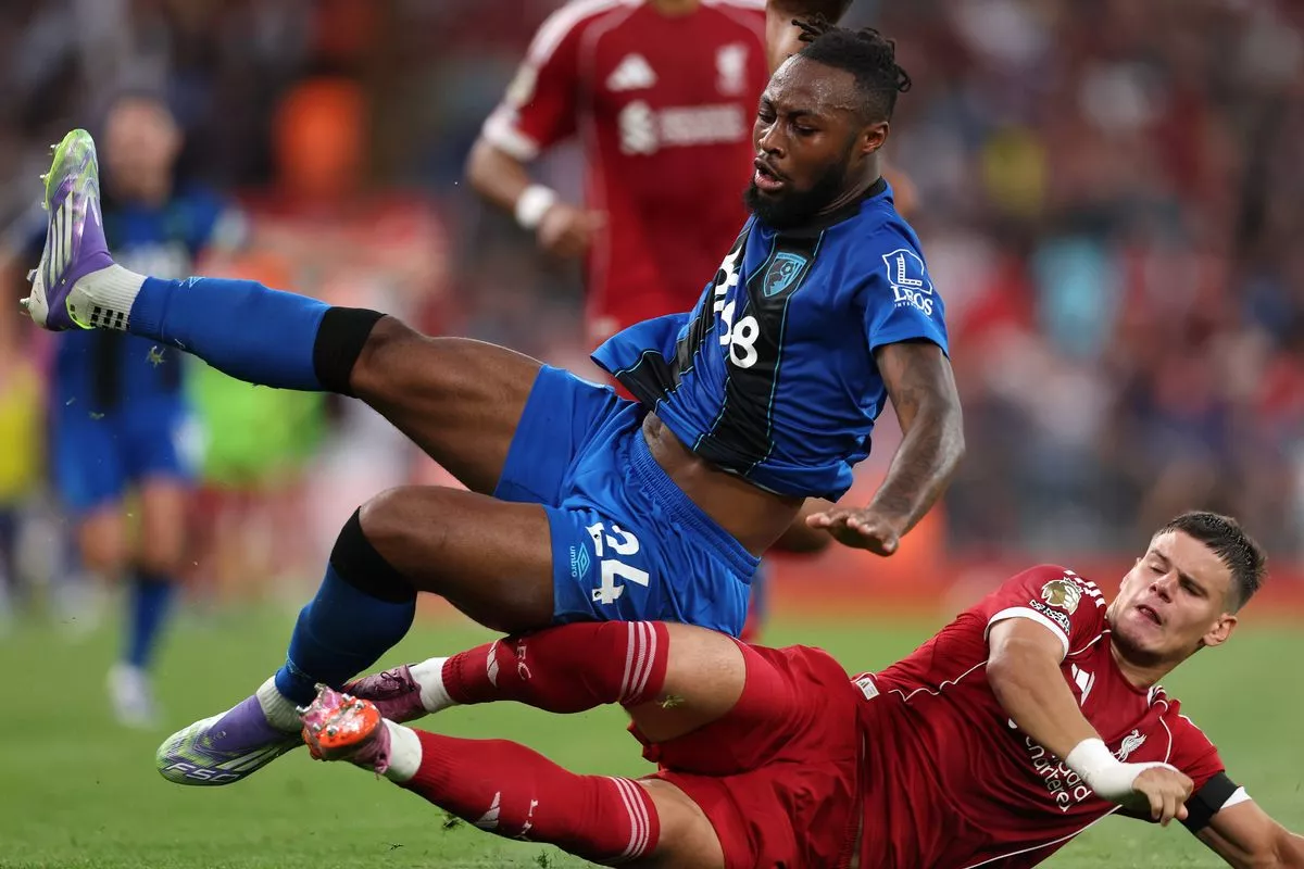 Milos Kerkez of Liverpool fouls Antoine Semenyo of Bournemouth during the Premier League match at Anfield on August 15 2025