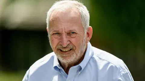 David Paul Morris/Bloomberg via Getty Images Larry Summers, a former Harvard University president, wears a blue shirt as he walks to lunch during the Allen & Co. Media and Technology Conference in Sun Valley, Idaho, US