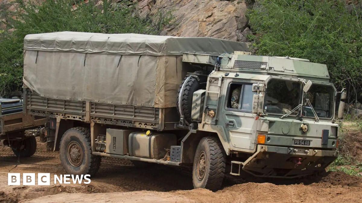 British army MAN support truck navigates its way through rough terrain