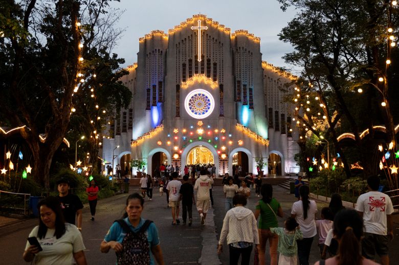 Catholics attend the first of the nine-day dawn mass known as Misa de Gallo, ahead of Christmas, at the National Shrine of Our Mother of Perpetual Help, in Paranaque, Metro Manila, on December 16, 2023.