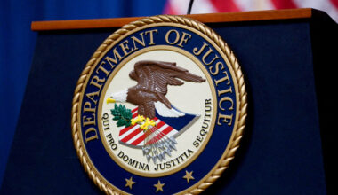 FILE PHOTO: U.S. Justice Department seal is seen at Justice Department headquarters in Washington