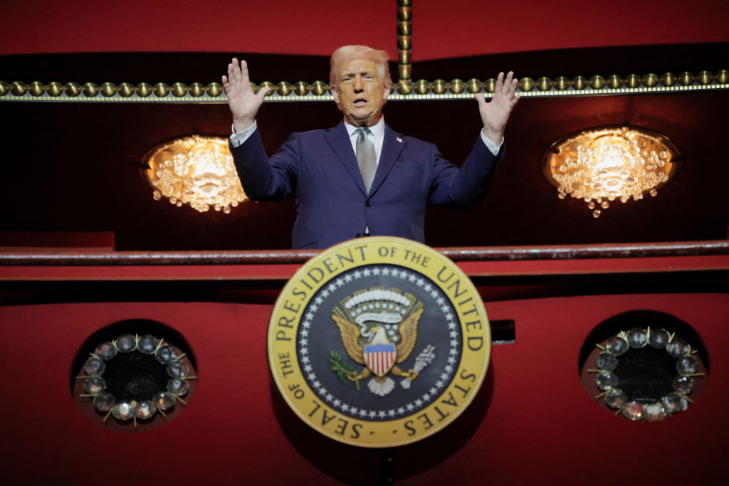 U.S. President Donald Trump stands at the presidential box at the Kennedy Center in Washington