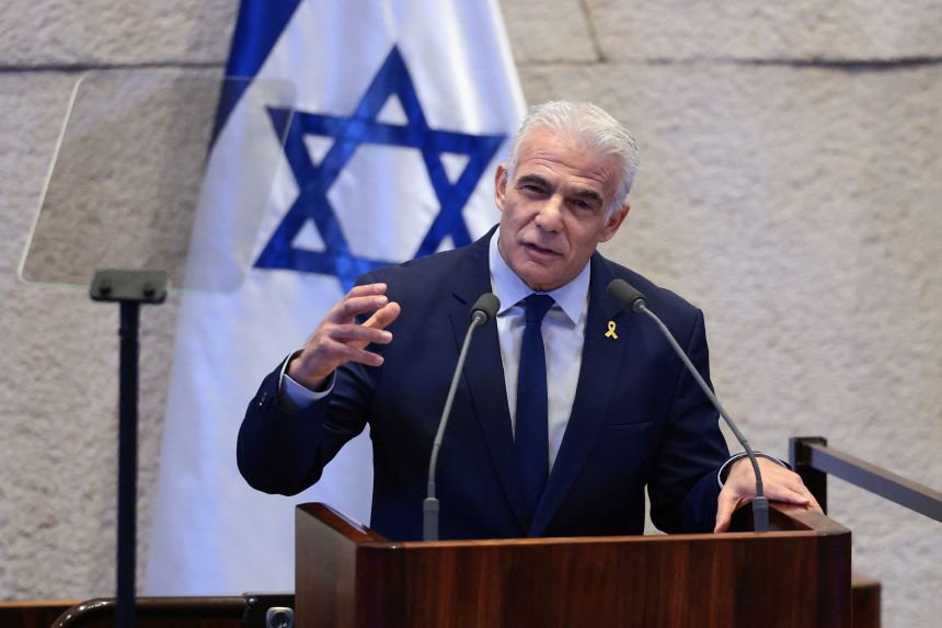 Israeli opposition leader Yair Lapid speaks at the Knesset in Jerusalem, on October 13, the day of US President Donald Trump gave an address to the body.