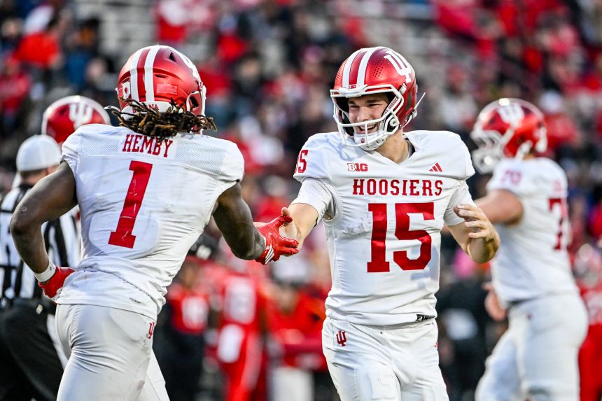 Indiana Hoosiers quarterback Fernando Mendoza (15) celebrates with running back Roman Hemby (1) after scoring a touchdown against the Maryland Terrapins on November 1.