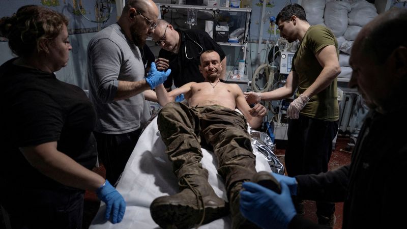 He was trapped on the front line for a month. Then a robot on wheels showed up