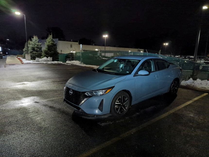 In this image released by the FBI, a gray Nissan car is parked at a storage facility where the Brown University shooting suspect killed himself in Salem, New Hampshire.