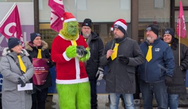 Grinch, coal, and yellow ties mark protest at Fedeli’s office about hospital service cuts