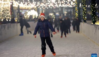 People visit Ala-Too Square during New Year event in Bishkek, Kyrgyzstan-Xinhua