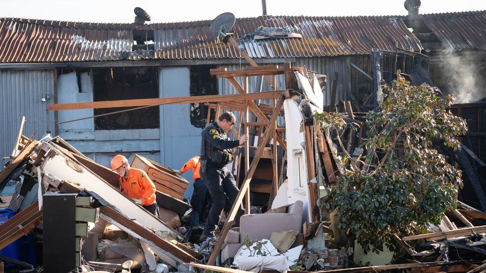Alameda County Police Officers and Search and Rescue access the aftermath at the site of the explosion on the 800 block of East Lewelling Boulevard, Thursday, Dec. 11, 2025, in Hayward, Calif. (AP Photo/Minh Connors)