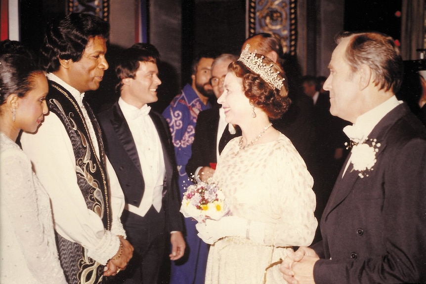 Kamahl meeting the queen after a performance 