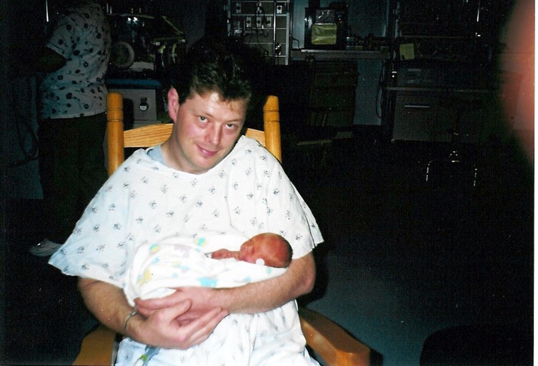 Russell Maze with his son, Alex, who was placed in neonatal intensive care after his birth in 1999.