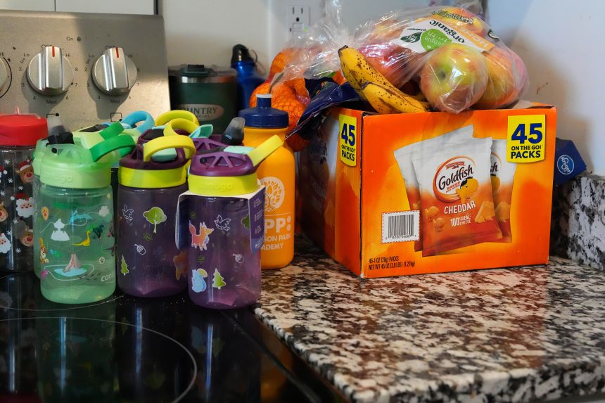 Donors supplied Irondi's family with water bottles and fresh produce.