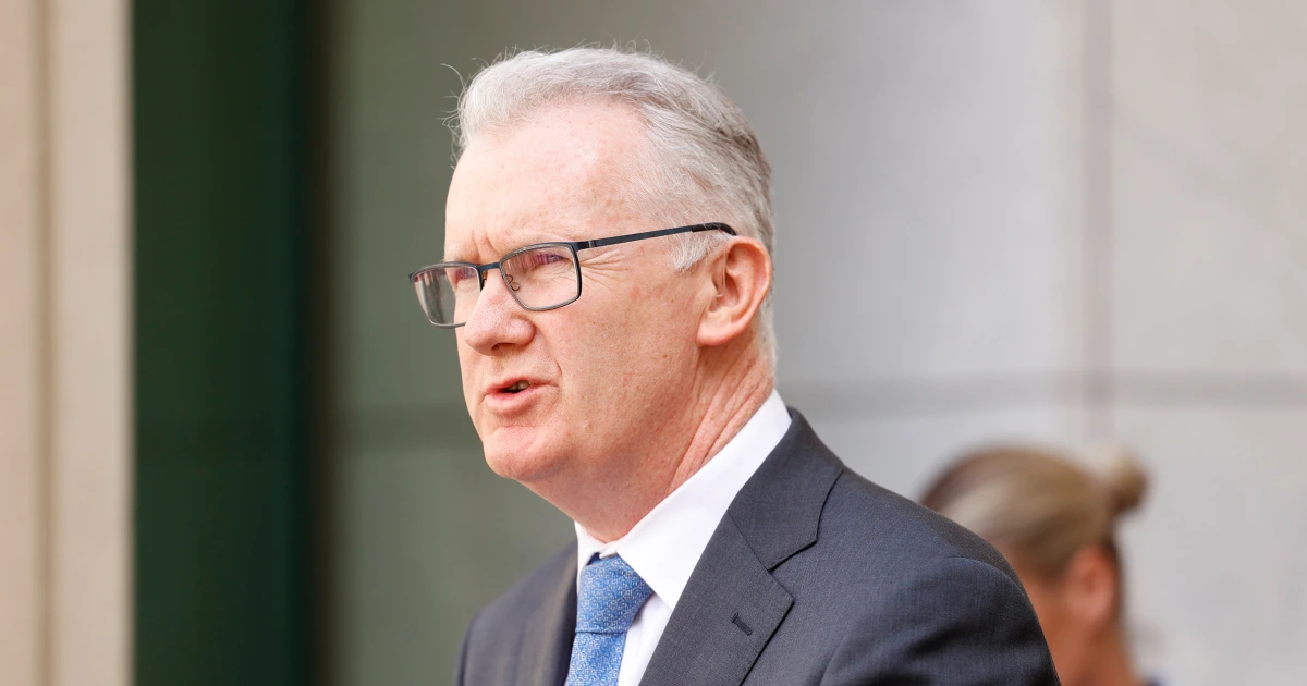 Australia cancels British man's visa after charges of displaying Nazi symbol